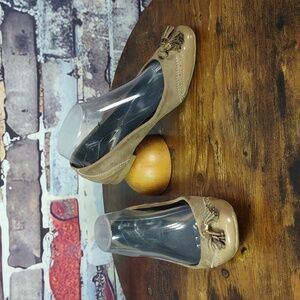 AKUA "Tiana" Tassel Spectator Flats